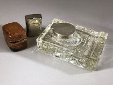 Collection of three inkwells: A leather cased travelling ink well with glass pot. A silver