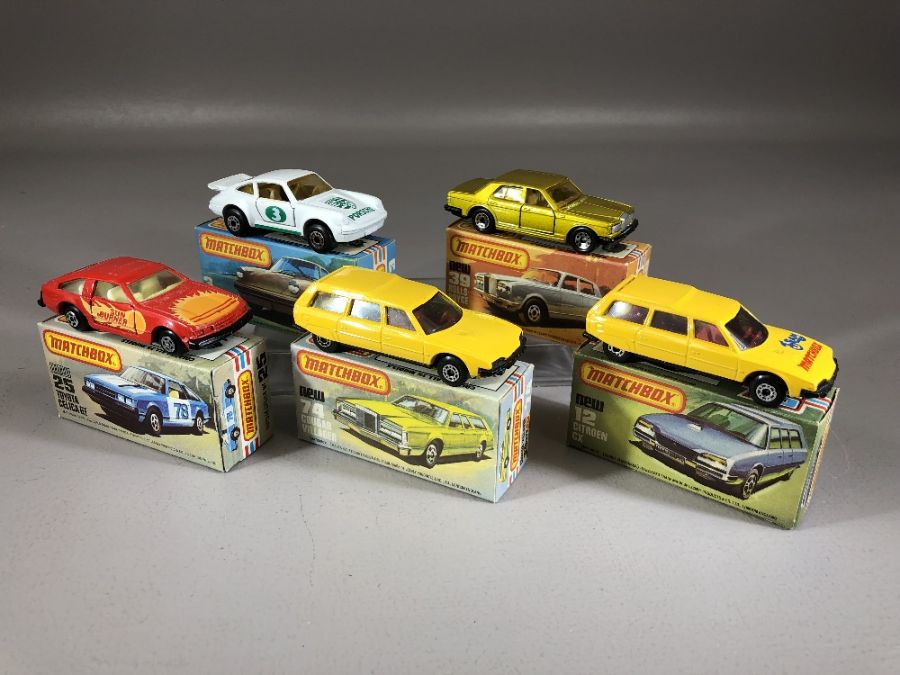 Five boxed Matchbox diecast model vehicles: Superfast 3 Porsche Turbo, 12 Citroen CX, 25 Toyota