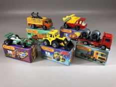 Five boxed Matchbox Superfast diecast model vehicles: 26 Cable Truck, 29 Tractor Shovel, 36