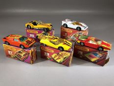 Five boxed Matchbox Streakers diecast model vehicles: 7 Hairy Hustler, 27 Lamborghini, 33 Datsun