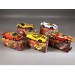 Five boxed Matchbox Streakers diecast model vehicles: 7 Hairy Hustler, 27 Lamborghini, 33 Datsun