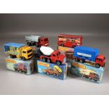 Five boxed Matchbox diecast model vehicles:17 The Londoner, Superfast 19 Cement Truck, 30 Artic