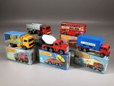 Five boxed Matchbox diecast model vehicles:17 The Londoner, Superfast 19 Cement Truck, 30 Artic