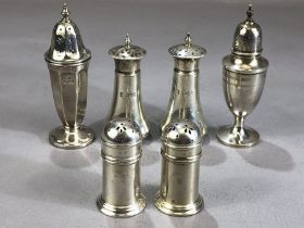 Three pairs of silver hallmarked cruets