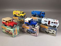 Five boxed Matchbox diecast model vehicles: 5 US Mail, 54 NASA Tracking Vehicle, 30 Artic ctruck,