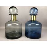 Two large contemporary apothecary-style glass jars with stoppers, each approx 38cm in height