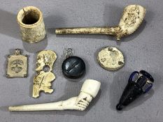 Interesting collection of curios to include an early scrimshaw figure, two vintage clay pipes, one