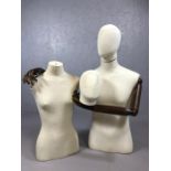 Fabric-covered male and female torso mannequins, the male with wooden articulated hands and arms