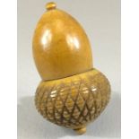 Nut thimble case in the shape of an Acorn which unscrews to reveal a silver hallmarked thimble