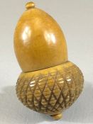 Nut thimble case in the shape of an Acorn which unscrews to reveal a silver hallmarked thimble