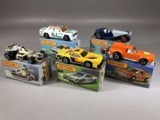 Five boxed Matchbox diecast model vehicles: 28 Formula Racing Car, Superfast 34 Vantastic, 34