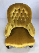 Antique fabric button back chair with original castors, approx 88cm tall