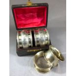 Pair of boxed Silver hallmarked napkin rings and a second unboxed pair