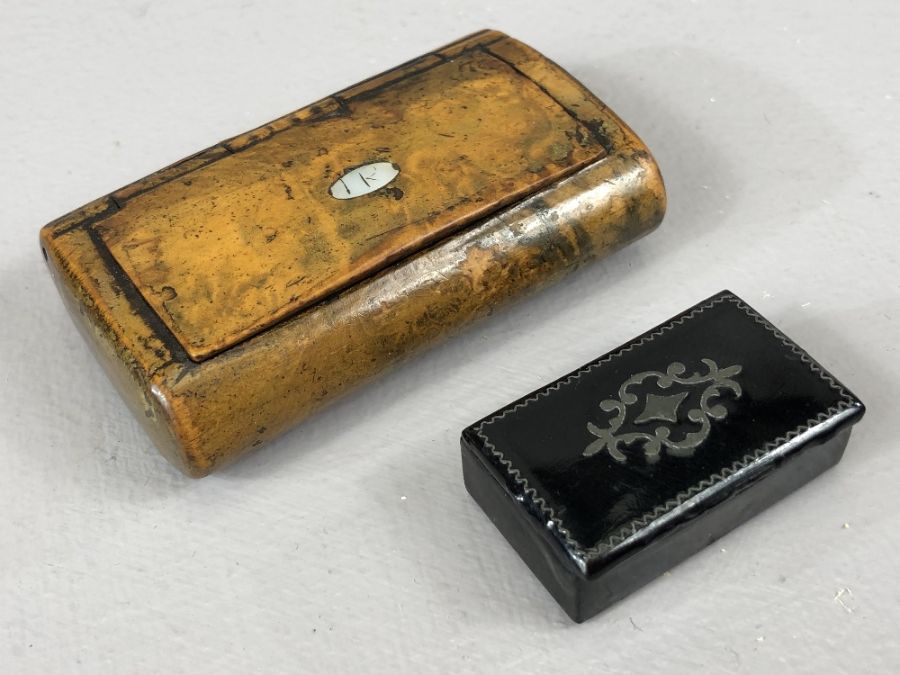 Two Georgian snuff boxes each with hinged lids