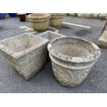 Three concrete garden planters