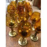 Collection of of 16 brass Mason 'constant flame' candle lamps with amber glass shades, each approx