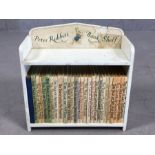 Vintage 'Peter Rabbit's Book Shelf' with 27 Beatrix Potter books (A/F)