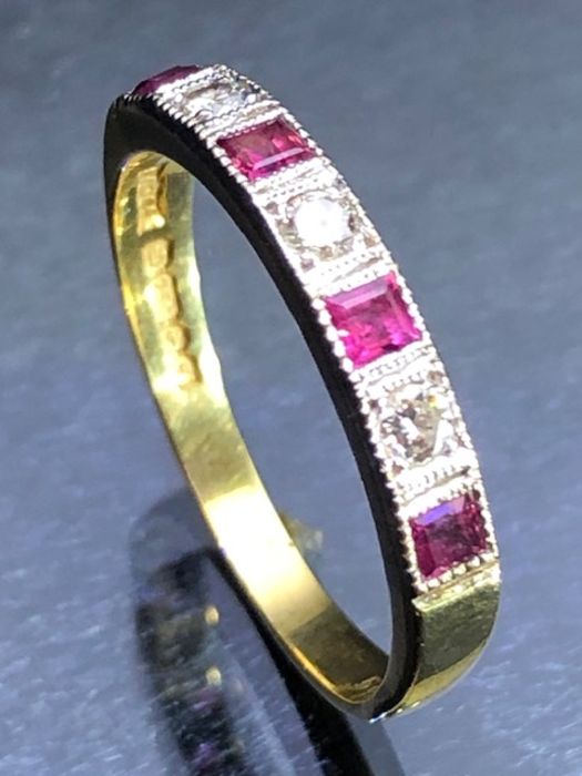 18ct fully hallmarked Gold ring set with Diamonds and Rubies approx size 'P'