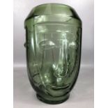 Contemporary green vase with face design to sides, approx 28cm in height