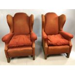 Pair of red fabric vintage wingback armchairs (A/F)