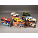 Five boxed Matchbox Rola-matics diecast model vehicles: 10 Piston Popper, 16 Badger, 20 Police