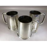 Three Elkington & Co stamped 21903 Silver coloured pint pots with glass bottoms