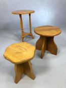 Three small pine tables