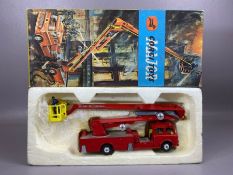 Boxed Corgi 1127 Simon Snorkel Fire Engine, with plastic fireman figure