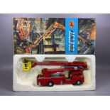 Boxed Corgi 1127 Simon Snorkel Fire Engine, with plastic fireman figure