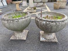 Two concrete garden planters, approx 34cm tall