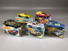Five boxed Matchbox diecast model vehicles: Superfast 3 Porsche Turbo, 12 Citroen CX, 16 Potiac,