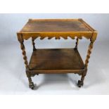 Vintage wooden tea trolley on turned wood legs and castors, approx 63cm x 45cm x 75cm tall