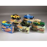 Five boxed Matchbox diecast model vehicles: Superfast 38 Armoured Jeep, 53 Flareside Pick-up,
