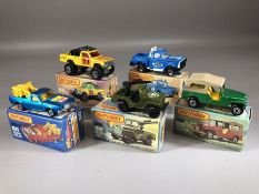Five boxed Matchbox diecast model vehicles: Superfast 38 Armoured Jeep, 53 Flareside Pick-up,
