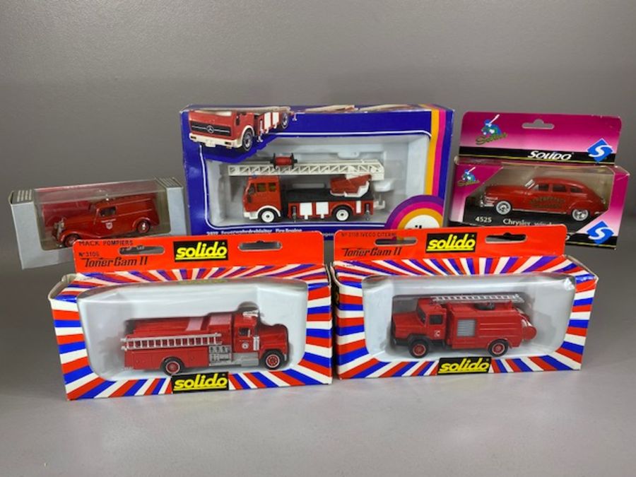 Boxed diecast fire vehicles to include Solido no.3118 and 3106 fire engines, Solido Chrysler