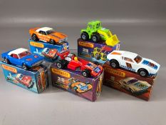 Five boxed Matchbox Superfast diecast model vehicles: 1 Dodge Challenger x 2, 8 De Tomaso Pantera,