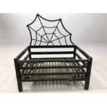 Iron fire grate with spider web design, approx 45cm x 35cm x 50cm tall (max)