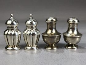 Two pairs of petite Hallmarked silver cruets (two with blue glass liners) the tallest pair approx