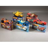 Five boxed Matchbox Superfast diecast model vehicles: 36 Formula 5000, 37 Skip Truck, 55 Hellraiser,
