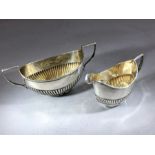 Silver hallmarked handled and fluted sugar bowl & milk jug approx 70g