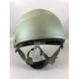 British military army uniform combat helmet ' MK 6 ', Dated 1990/91, having a khaki green shell,