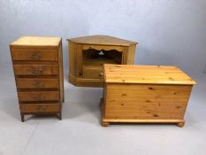 Three pieces of pine furniture to include blanket box, small chest and a corner TV unit