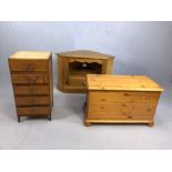 Three pieces of pine furniture to include blanket box, small chest and a corner TV unit