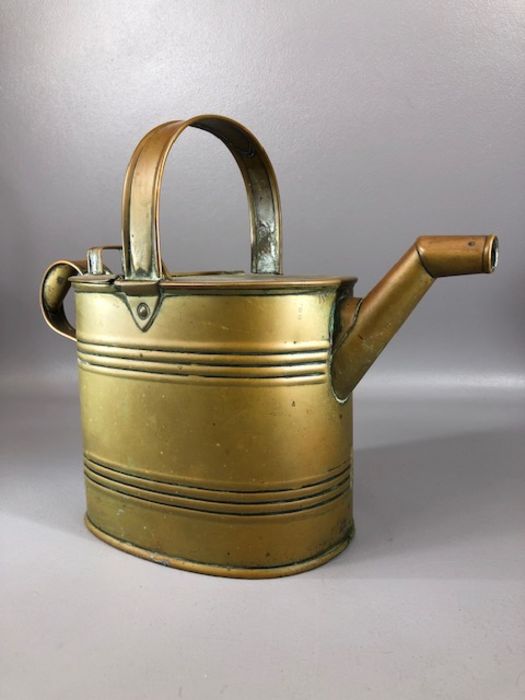 Army and Navy watering can, approx 25cm in height