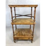 Burr walnut two tier tea trolley with single drawer, on castors along with a burr walnut low