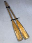 Pair of vintage wooden rowing oars, approx 180cm in length