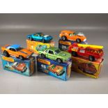 Five boxed Matchbox Superfast diecast model vehicles: 1 Dodge Challenger, 4 Pontiac Firebird, 22