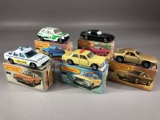 Five boxed Matchbox diecast model vehicles: 8 Rover 3500, Superfast 21 Renault 5TL, 56 Mercedes
