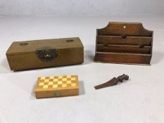 Small collection of wooden items to include Chinese style lidded box, letter rack, a rhinoceros