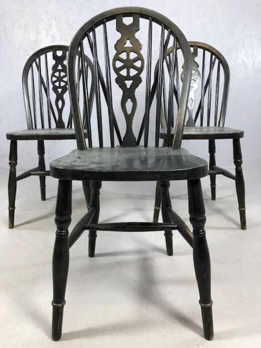 Set of three black Windsor wheel back dining chairs - Image 2 of 3